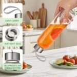 12 Pack 18oz Glass Bottles with Lids Carry Strap for Juicing, Reusable Clear Glass Water Bottle with Stainless Steel Airtight Cap for Refrigerator, 100% Leak Proof, BPA Free Drinking Jar - Image 5