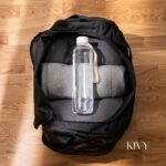 KIVY Slim Water Bottle 32oz [Lightweight & Shatterproof Tritan] Fits Backpack & Cupholder for Travel, Sports, School, Gym - Clear water bottle with measurements - Transparent Beige - Dishwasher Safe - Image 3