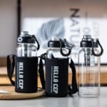 34oz Glass Water Bottle with capacity Mark & Stainless Steel Tea Strainer-Large Capacity for Hot/Cold Drinks,Coffee,Tea,and Water-Includes Protective Sleeve,Perfect for Home,Office (34oz) - Image 4