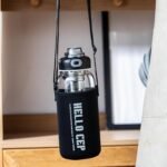 34oz Glass Water Bottle with capacity Mark & Stainless Steel Tea Strainer-Large Capacity for Hot/Cold Drinks,Coffee,Tea,and Water-Includes Protective Sleeve,Perfect for Home,Office (34oz) - Image 6