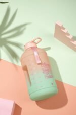 H2O Capsule INSPO Gallon Water Bottle with Time Marker and Straw Motivational Hydration Tracker Jug Big BPA-Free Food-Safe Leakproof Drinking Bottle with Handle & Strap, Lotus Blossom - Image 4