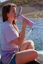 Stanley Quick Flip GO Water Bottle 36 oz | Push Button Lid | Leakproof and Packable for Travel and Sports | Insulated Stainless Steel | BPA-Free | Lilac - Image 5