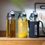 Aurfedes 35oz Glass Water Bottles with Time Marker & Straw, BPA-Free Leakproof Glass Drinking Bottles with Protective Sleeve & Tea Infuser for Office Travel Sport (4PCS) - Image 4