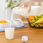 ZAVOOS 4 Pack Glass Milk Bottle, 34 Oz Reusable Juice Drinking Jar with Airtight Lid, Heavy Duty Leakproof Water Bottles Container for Iced Tea, Beverage, Smoothies Storage - Image 5