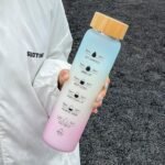 HOLABEAR Glass Motivational Daily Water Intake Bottle with Time Marker 32oz, Reusable, with Leakproof Bamboo Lid and Shoulder Sleeve, for Hot and Cold Drinks, BPA Free(Blue) - Image 5