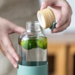 wangsdjy 34oz Glass Water Bottles with Silicone Sleeve, BPA Free Water Bottle Glass with Leak-Proof Lid, Reusable Water Bottle for Hot & Cold, Ideal for Hiking Travel Gym office (Green) - Image 5