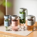 DNIENKGE Glass Tea Bottle 16 oz Drinking Bottle with Non-Slip Holster, and Stainless Tea Infuser,Leak Proof Lid,Portable Glass Water Bottle for School, Office, Car & Home,as a gift, etc (Green) - Image 4