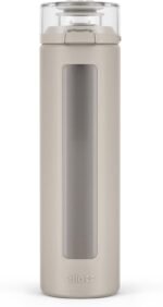 Ello Syndicate 20oz Reusable Glass Water Bottle with One-Touch Leak Proof Flip Lid, Protective Non-Slip Silicone Sleeve, Carry Loop for Coffee, Tea and Water, BPA-free, Dishwasher Safe, Sand - Image 2