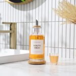 11.8OZ Glass Mouthwash Dispenser for Bathroom with Stainless Steel & Bamboo Nozzle, Mouthwash Cup Reusable, Bamboo Tray, and Elegant Gold Sticker.（Clear - Image 3